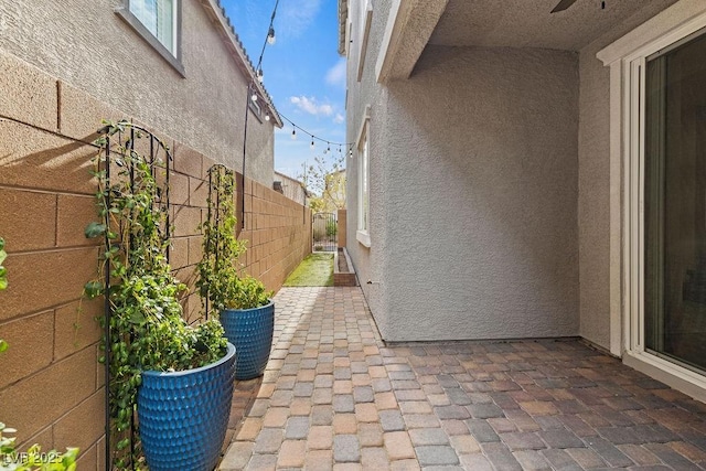 view of side of home featuring a patio