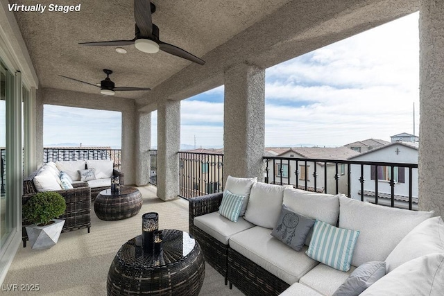 view of patio featuring an outdoor living space and a balcony