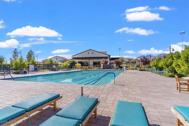 view of swimming pool with a patio