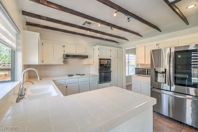 kitchen featuring black appliances, white cabinets, sink, and tile countertops