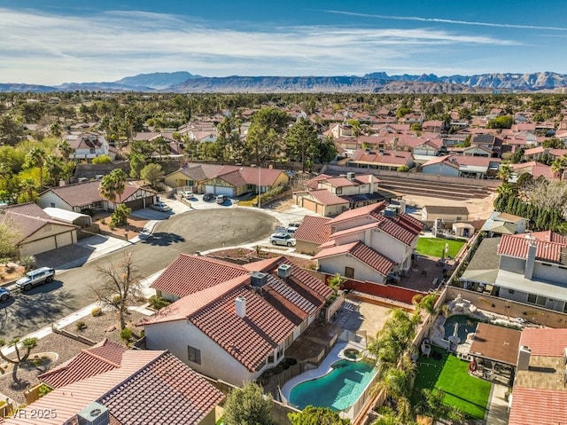 bird's eye view with a mountain view