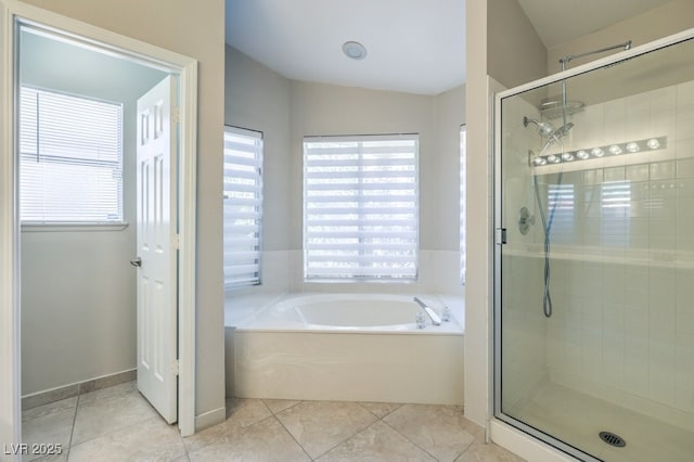 bathroom featuring tile patterned floors and plus walk in shower