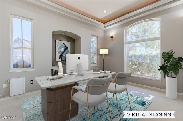 office area featuring a tray ceiling and ornamental molding