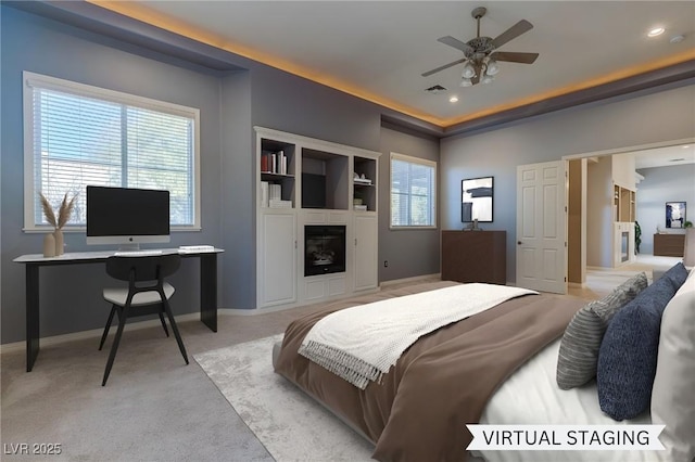 carpeted bedroom featuring ceiling fan