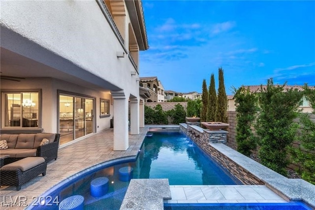 view of pool with pool water feature, a patio area, and a jacuzzi