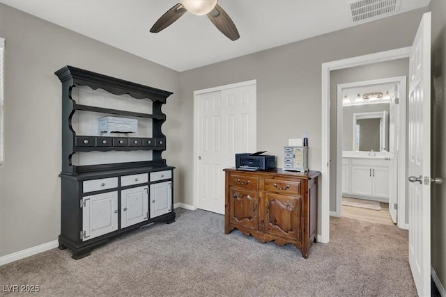 interior space featuring ceiling fan