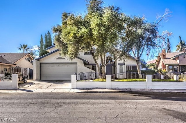 view of front of property with a garage