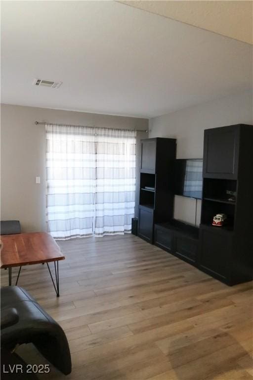 living room with hardwood / wood-style flooring