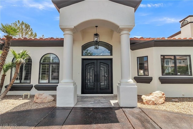 doorway to property with a porch