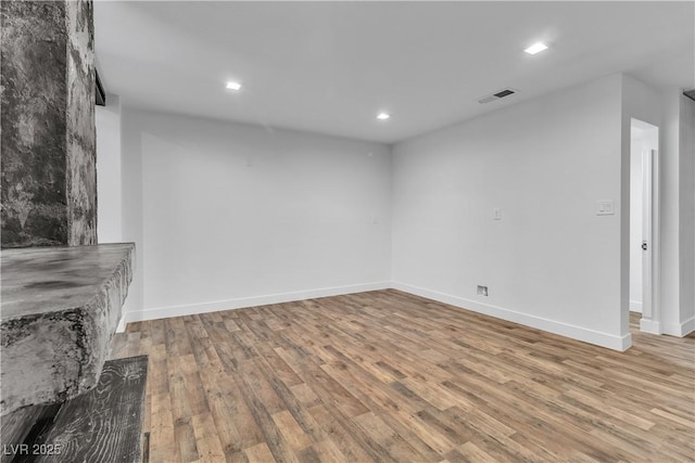 unfurnished living room featuring light hardwood / wood-style floors