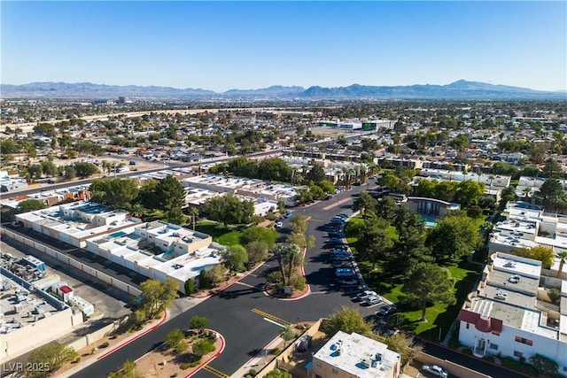 drone / aerial view featuring a mountain view