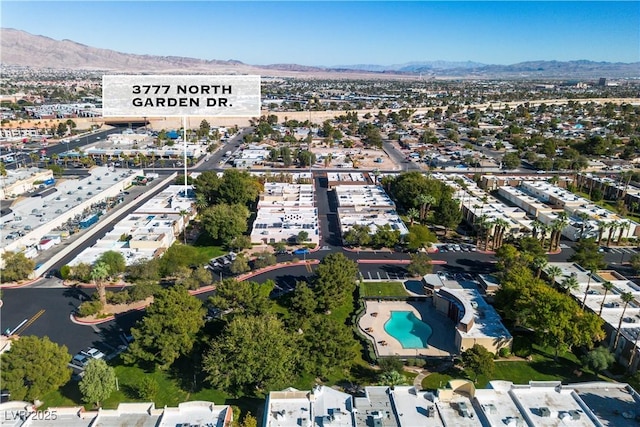 drone / aerial view featuring a mountain view