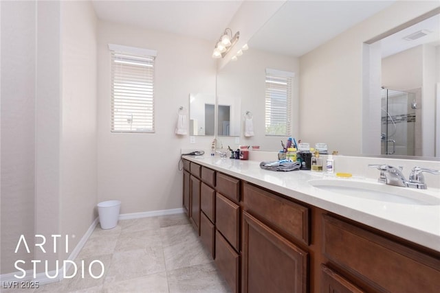 bathroom with vanity and an enclosed shower