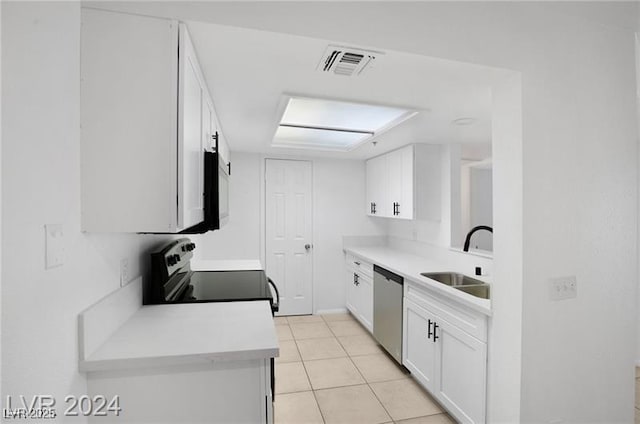 kitchen with range with electric cooktop, stainless steel dishwasher, sink, white cabinets, and light tile patterned flooring