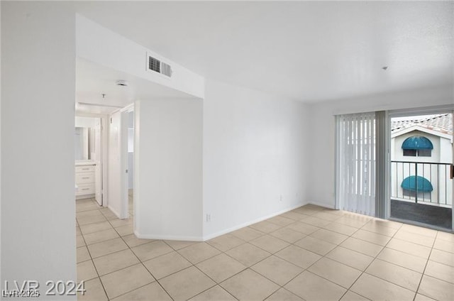 view of tiled spare room