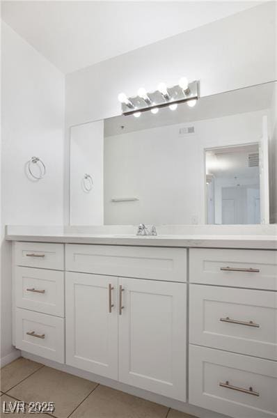 bathroom featuring tile patterned floors and vanity