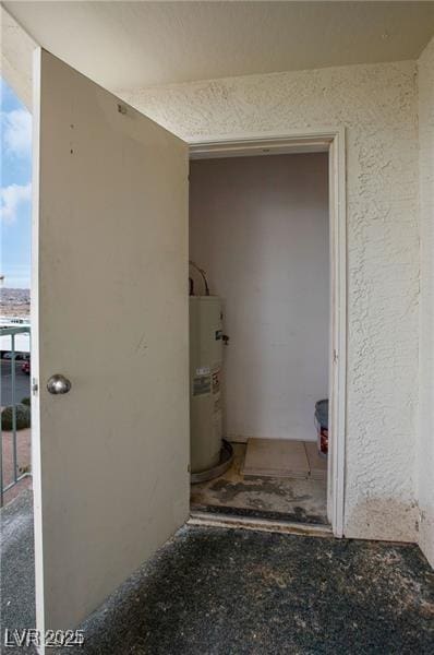 bathroom featuring gas water heater