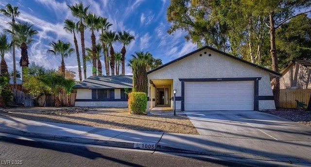 single story home featuring a garage