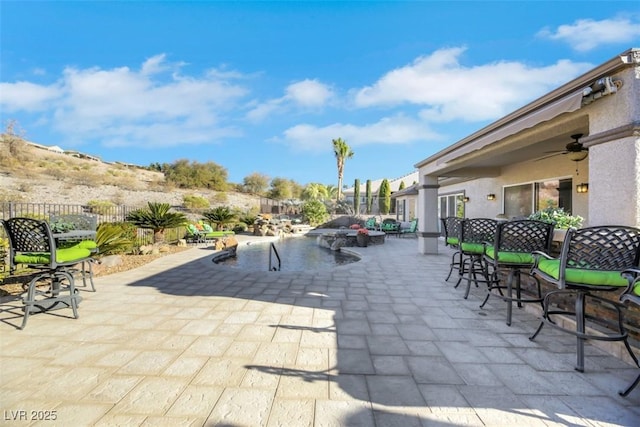 view of patio / terrace with ceiling fan