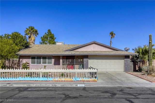 single story home with a garage