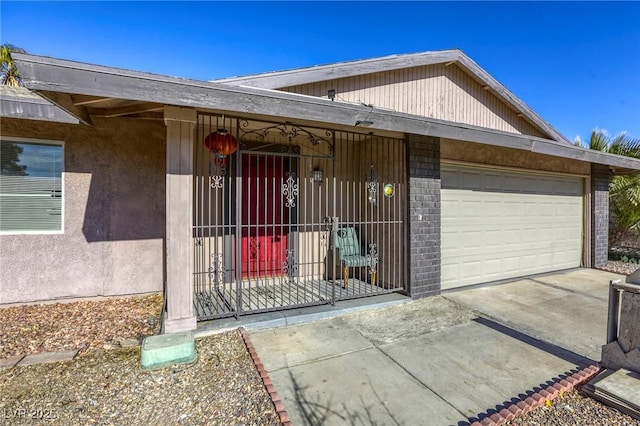 view of front of property featuring a garage