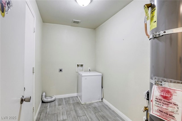 clothes washing area featuring washer hookup and electric dryer hookup