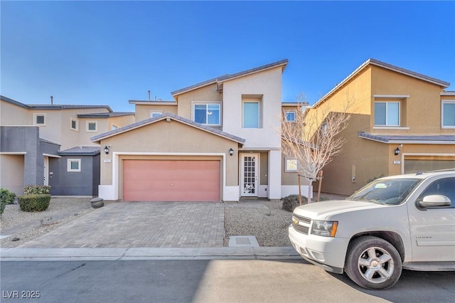 view of front of property featuring a garage