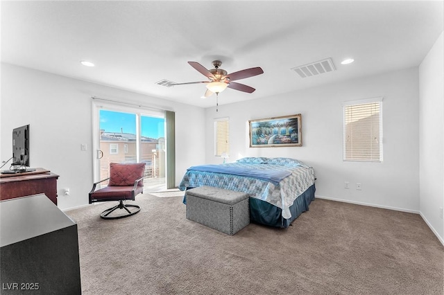 carpeted bedroom featuring access to exterior and ceiling fan