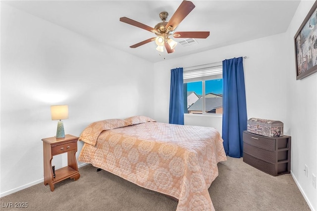 bedroom featuring ceiling fan and carpet floors