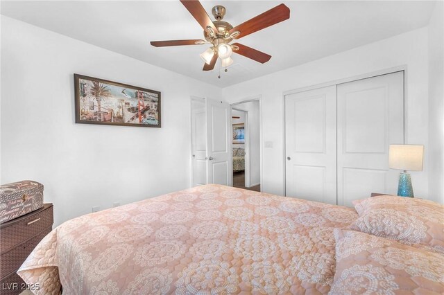 bedroom with a closet and ceiling fan