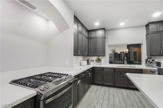 kitchen featuring stainless steel appliances and sink