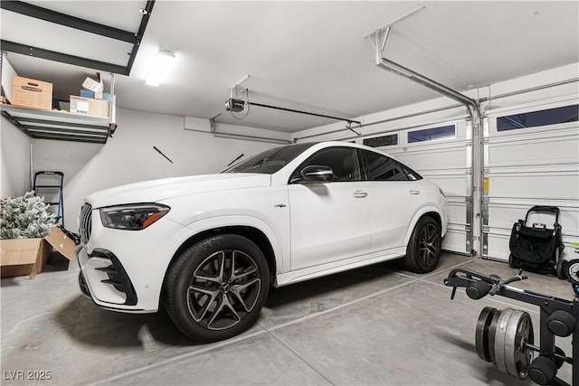 garage featuring a garage door opener