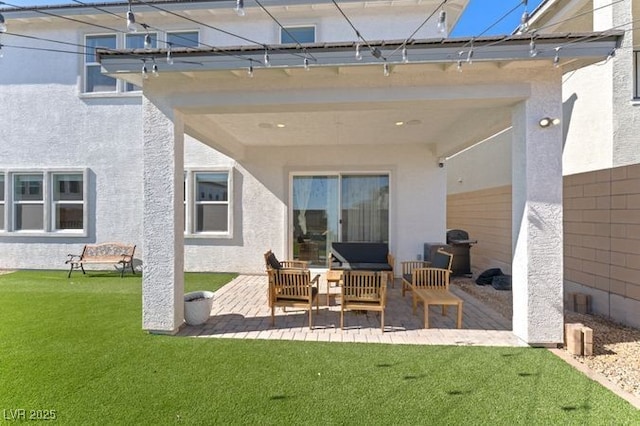 view of patio featuring fence and area for grilling