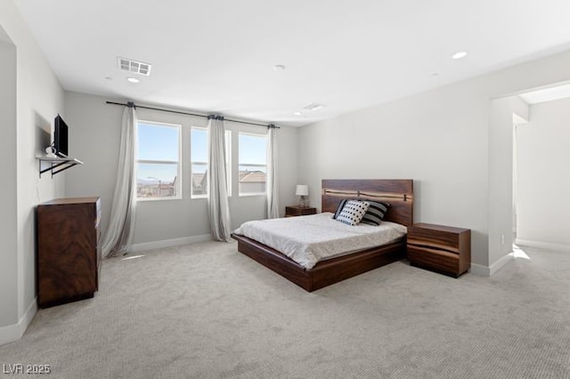 bedroom featuring recessed lighting, baseboards, visible vents, and light colored carpet