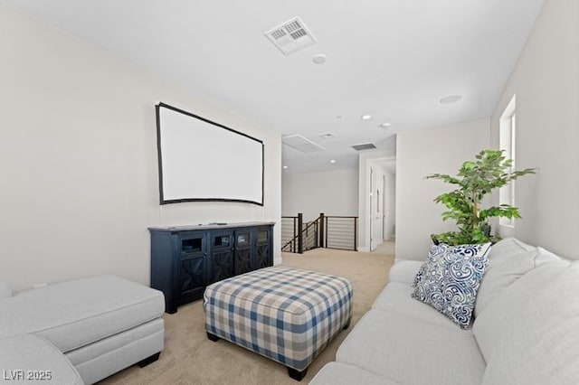 living room with light carpet and visible vents