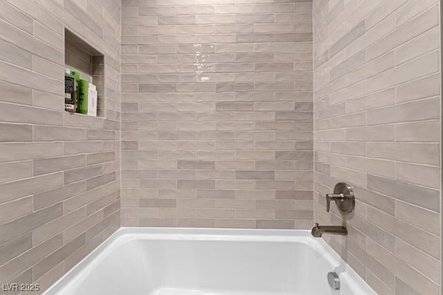 full bathroom with shower / tub combination