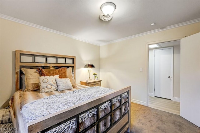 bedroom with light carpet and ornamental molding