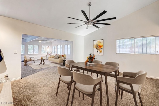 dining area with lofted ceiling, baseboards, carpet floors, and ceiling fan