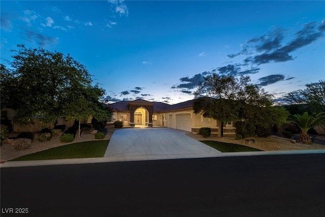 view of front of home with a garage