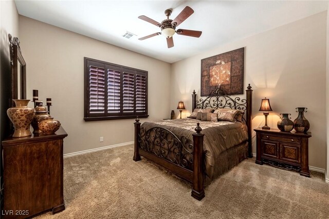 bedroom featuring light carpet and ceiling fan