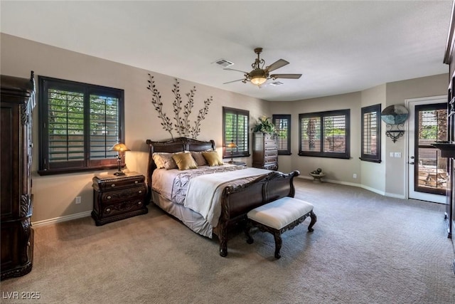 bedroom featuring ceiling fan and carpet