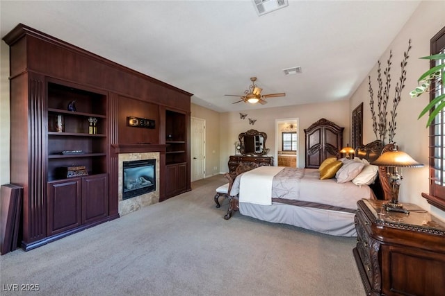 carpeted bedroom featuring ceiling fan