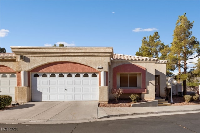 view of front of property with a garage