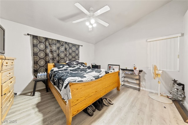 bedroom featuring wood-type flooring, ceiling fan, and lofted ceiling