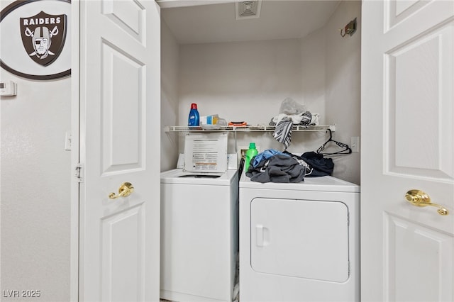 laundry area with washer and dryer