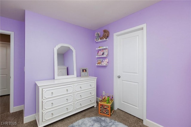 bedroom with dark carpet