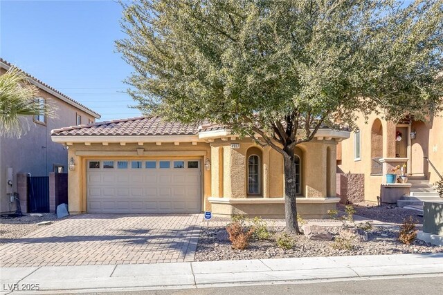 view of front of property with a garage