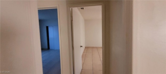 hall featuring tile patterned floors