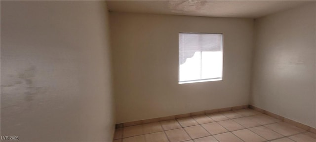 view of tiled spare room