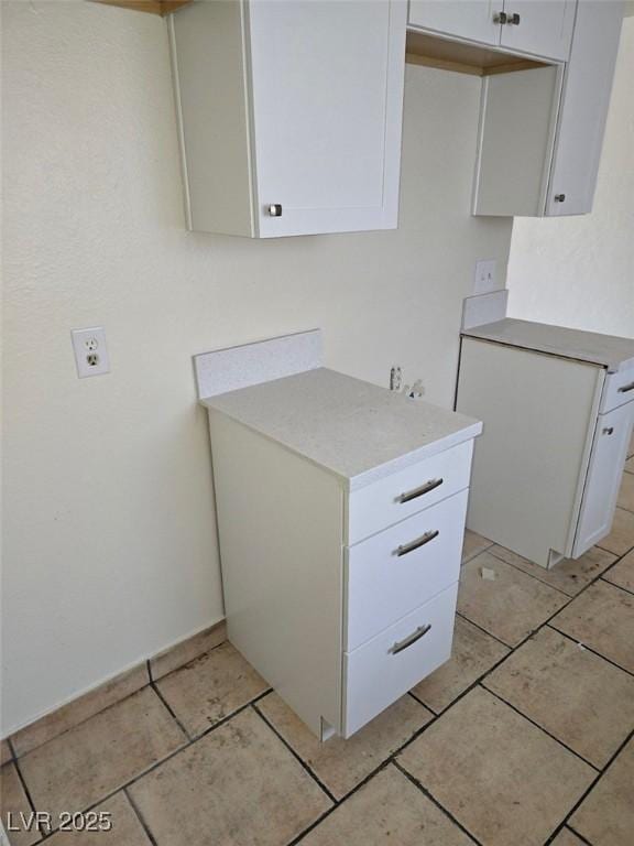 kitchen with white cabinets